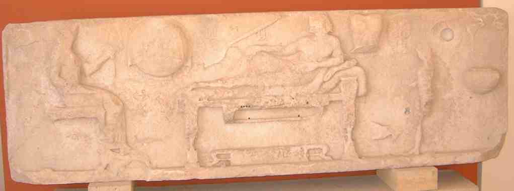 The poet Archilochos, reclining: Paros Museum.